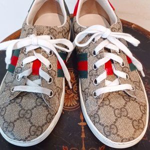 Kids size 13 used but in fair condition Ace Supreme GG Gucci sneakers.